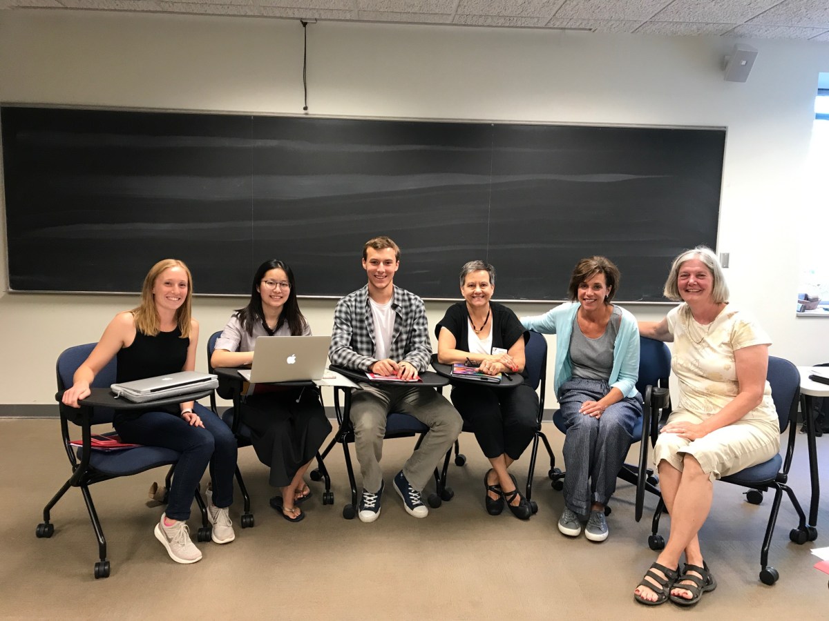 Carleton College students volunteer with survey analysis